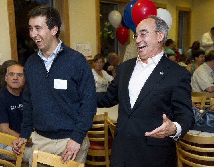 Bruce Poliquin celebrates with his son Sam after winning the Republican nomination in Maine's 2nd Congressional District in 2014. The congressman said Thursday, "My own son has an asthma condition, a pre-existing condition." The bill that Poliquin voted for Thursday would undermine protections for people with pre-existing conditions, but exempt Congress and congressional staff members from such provisions.
