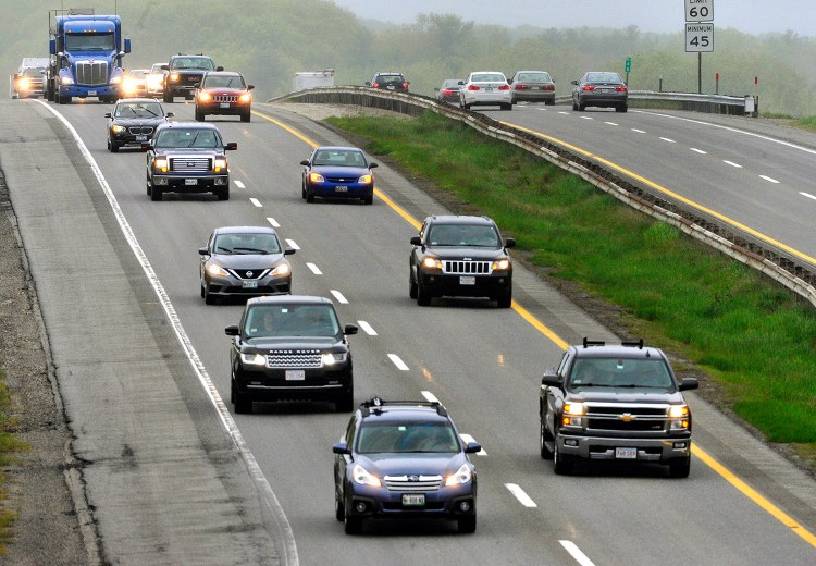 Memorial Day holiday traffic builds on the Maine Turnpike in Portland on Friday. The Maine Turnpike Authority expects about 960,000 vehicles on the highway this weekend.