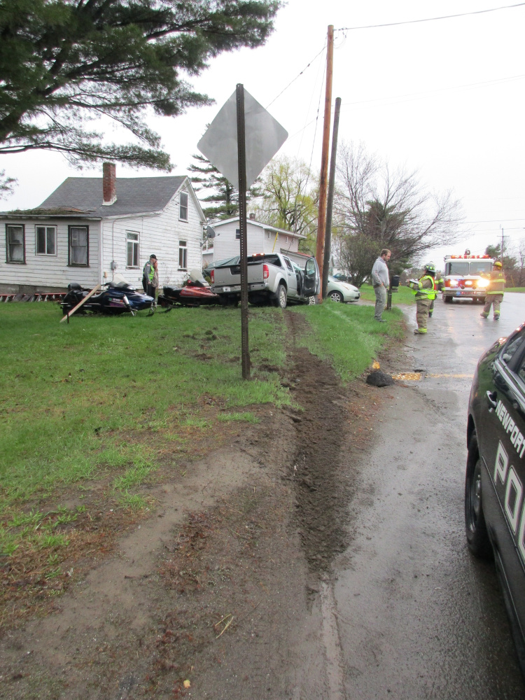 Electrical service was ripped off a house in Newport on Tuesday morning after a pickup truck crashed into a utility pole.