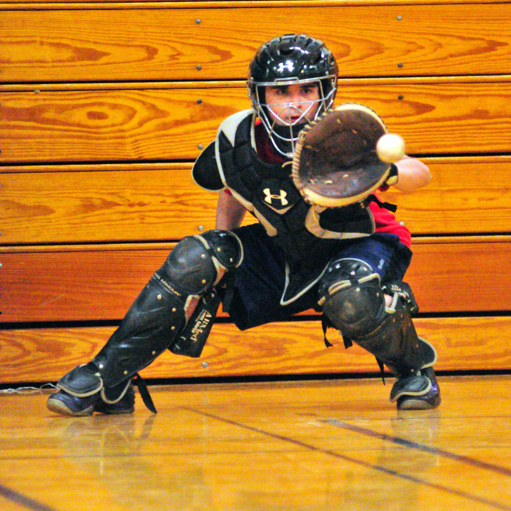 Erskine catcher Nick Turcotte catches a pitch during a March preseason practice in South China.