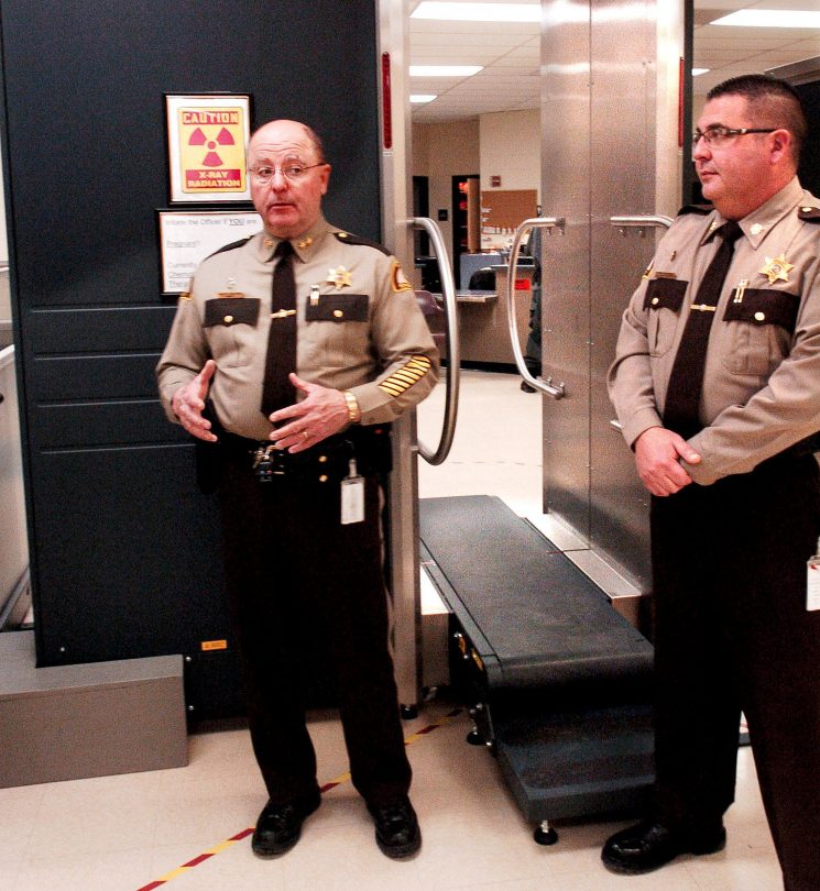 Somerset County Sheriff Dale Lancaster, left, and Somerset Jail Administrator Cory Swope discuss a new state-of-the-art body scanner Jan. 19 at the intake department at the East Madison jail. The scanner detected drugs on an inmate, and jail officials believe not all of it was detected. They are investigating the incident and charges are expected.