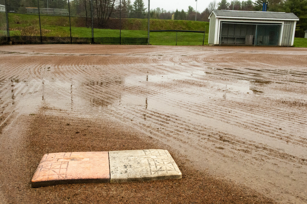Standing water is shown on the softball field at Maranacook Community School in Readfield.