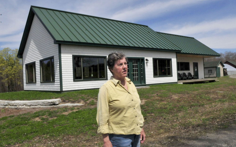 Mary Burr speaks Thursday about her restaurant, 122 Corson, the same as its address in Mercer. The restaurant features locally grown and raised meats and vegetables complete with fancy desserts and alcoholic beverages in a country setting.