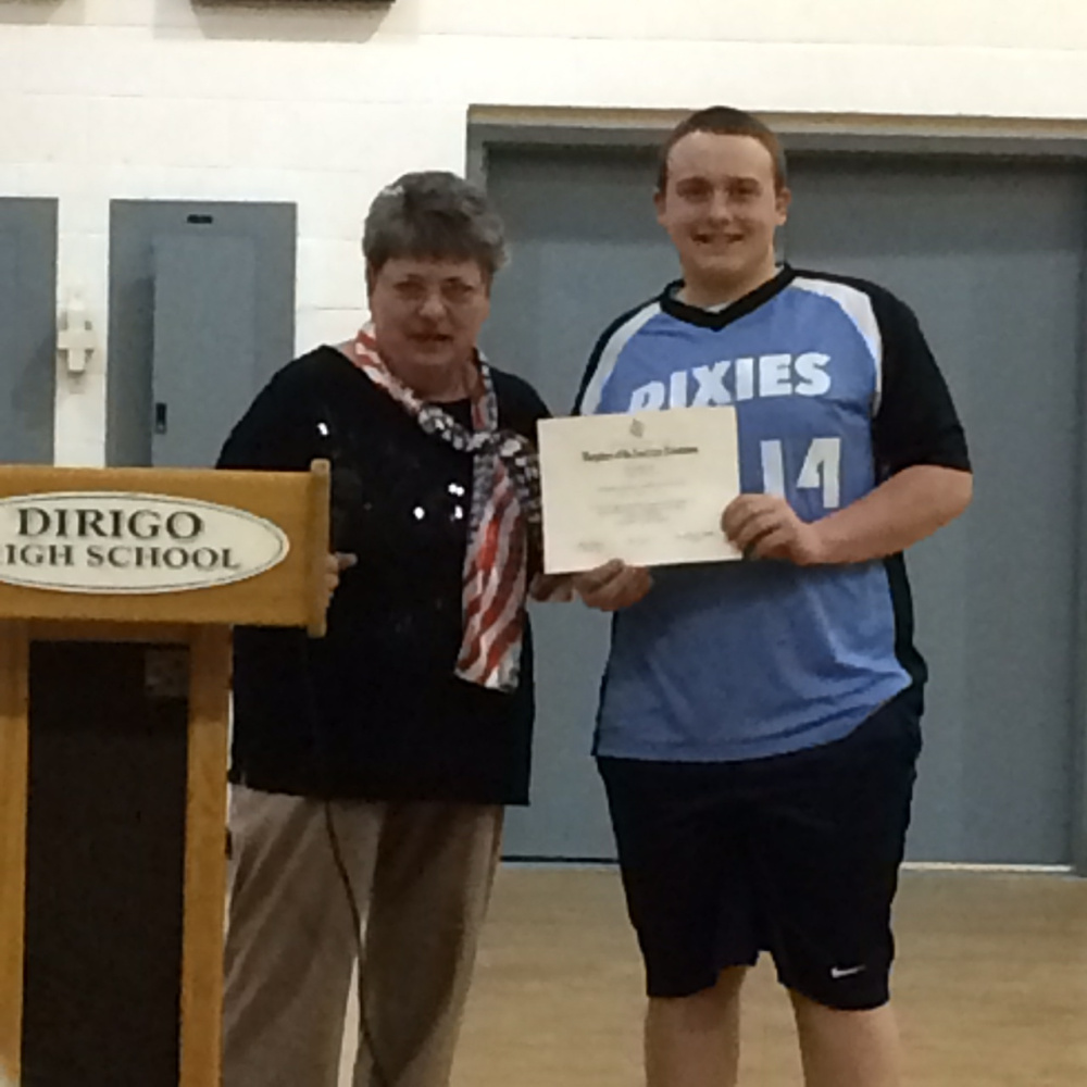 Mason Corriveau, right, a Dirigo High School senior, recently was presented a 2017 Good Citizen Award by Charlotte Collins, a member of The Colonial Daughters Chapter Daughters of the American Revolution of Farmington, during an assembly.