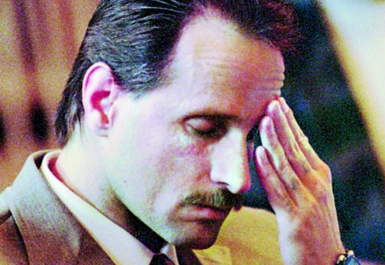 Robert Wayne Lonardo wipes his forehead Oct. 31, 1995, while listening to closing arguments in his murder trial at Lincoln County Superior Court in Wiscasset. Lonardo was found guilty in the murder of Marianne Pembroke during a botched July 21, 1994, burglary of her home in Waterville. Lonardo is seeking a postconviction review, arguing a plea bargain was not communicated to him properly.
