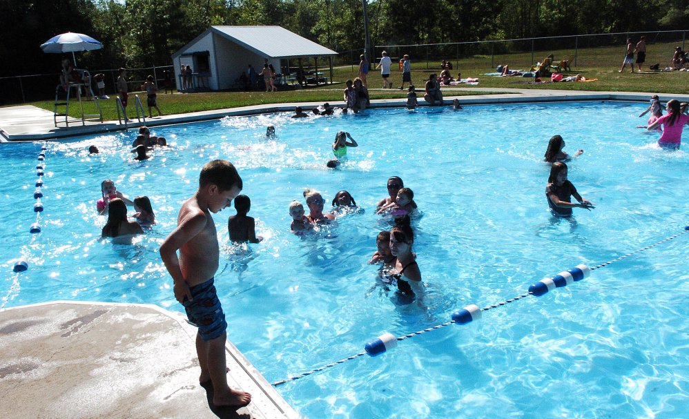 Kids and parents enjoy the Alfond Municipal Pool in Waterville on August 21, 2016. City councilors will consider a hike in pool fees at their meeting Tuesday.