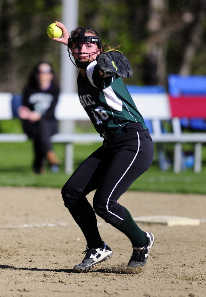 Carrabec shortstop Paige Giroux throws to first after fielding a grounder against Monmouth on Tuesday in Monmouth.