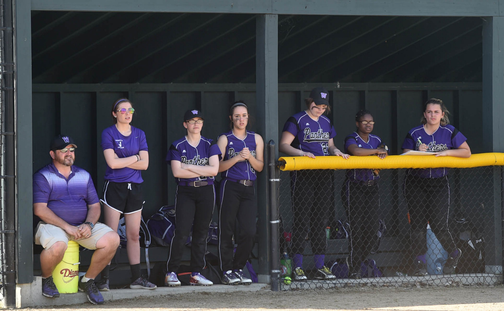 Members of the Waterville softball team watch the action against Medomak on Wednesday afternoon.