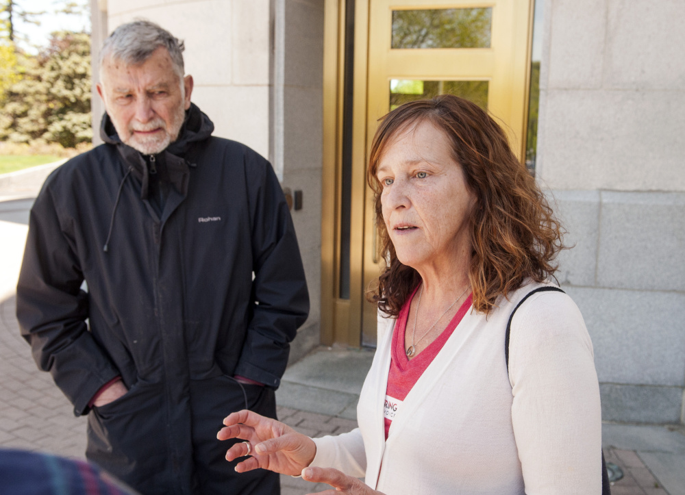 Chip Angell, of Brooklin, left, and Jeanne Gore, of Shapleigh, talk about mental health laws during an interview on Saturday at the Maine State House in Augusta.