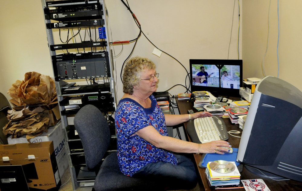 Central Maine Community Access television station manager Laura Guite works in the broadcast room in Fairfield on Thursday.