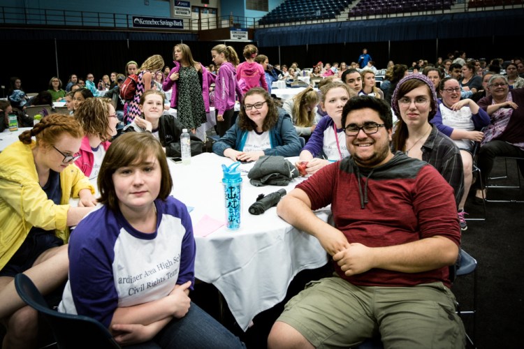 Gardiner Area High School students attend the Civil Rights Team Project at the Augusta Civic Center on Monday. Shown are: front, left to right, Melanie Mansir, 17, of South Gardiner; Lilly Lancaster, 17, of Randolph; Matteo Ortiz, 19; of Pittston; and Devon Hall, 18, of Gardiner. Back row, Lauren Mathews, 17, of Randolph, Brooke McLaughlin, 15; Jaime Frye, 15; and, Brooke Moloney, 17, all from Gardiner