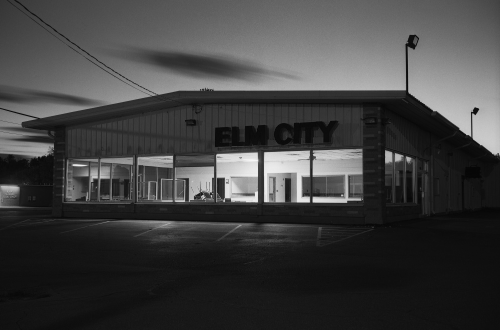 Gary Green, Elm City Motors, College Avenue, Waterville, ME, 2011, archival pigment print, lent by the artist.