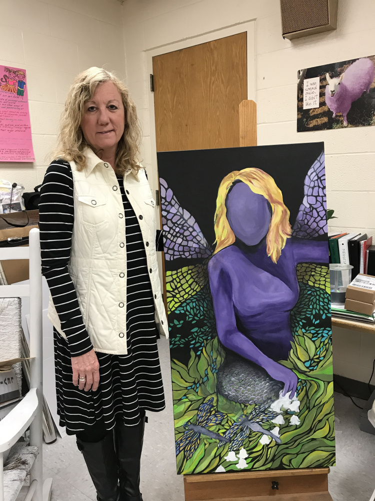 Artist and teacher Sonja Eustis Johnson with her painting, an acrylic psychological self-portrait; one of the images that will be on display at the inaugural show of the Lakeside Contemporary Art Gallery, 5-7 p.m., May 27, in Rangeley. The show will feature original artwork created to embody the concepts for instruction while encouraging a creative approach to problem solving and advancement of artistic voice to her students in five different instructional units. Student work from these units will also be on display.