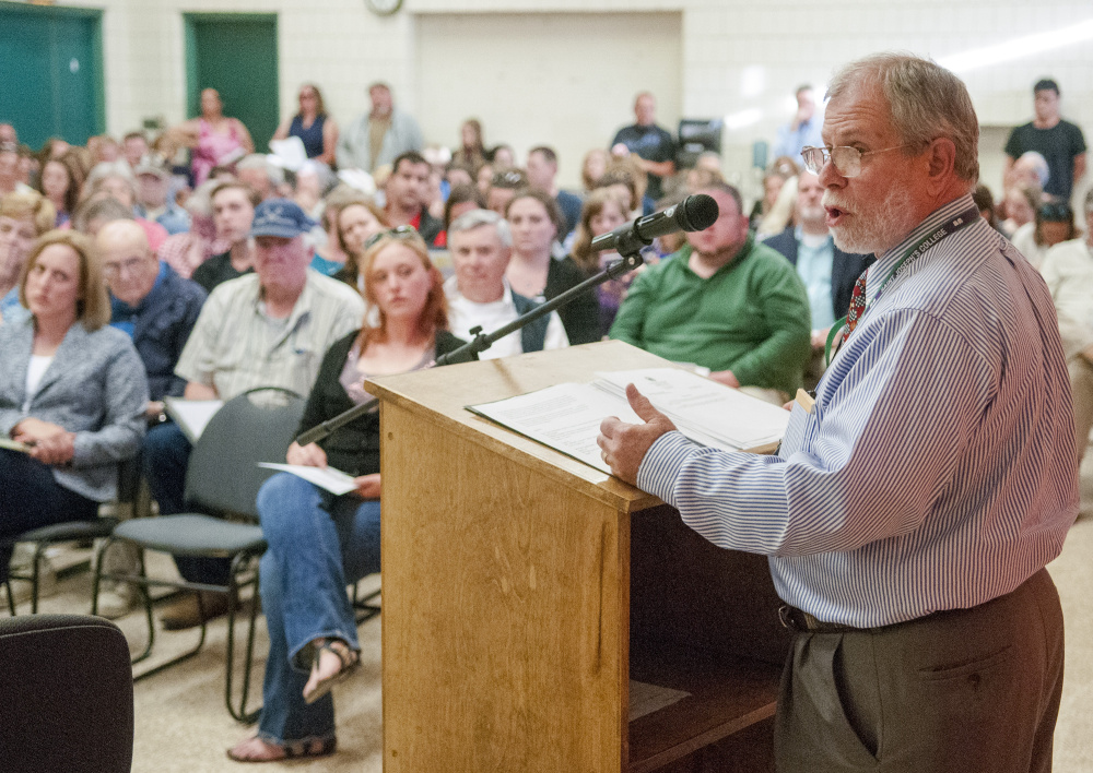 Winthrop Schools Superintendent Gary Rosenthal speaks on Tuesday during a Town Council meeting at Winthrop Town Hall, where concerned residents opposed proposed cuts in the school budget.