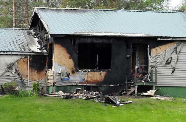 The rear section of Sumner "Bud" Jones' home on Peltoma Avenue in Pittsfield sustained extensive damage Tuesday from a fire.
