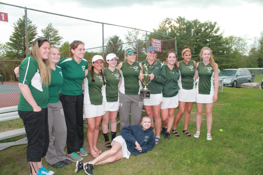 The Winthrop girls tennis team celebrates after winning the Mountain Valley Conference championship over Carrabec in Waterville on Wednesday.