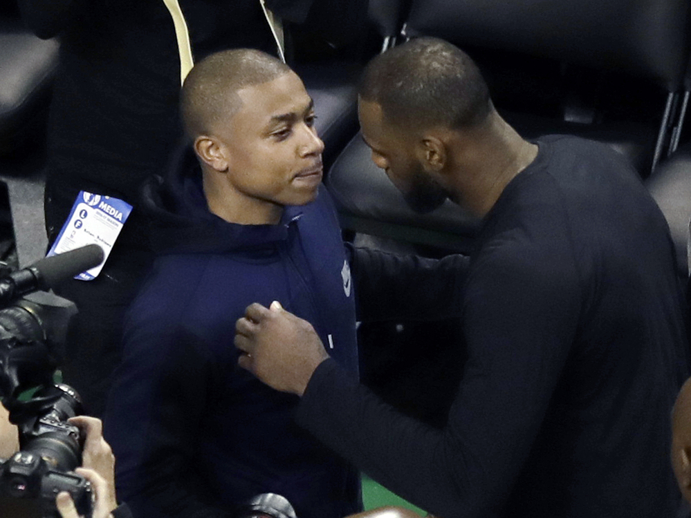 Boston Celtics guard Isaiah Thomas, left, and Cleveland Cavaliers forward LeBron James speak after Game 5 of the Eastern Conference finals on Thursday.