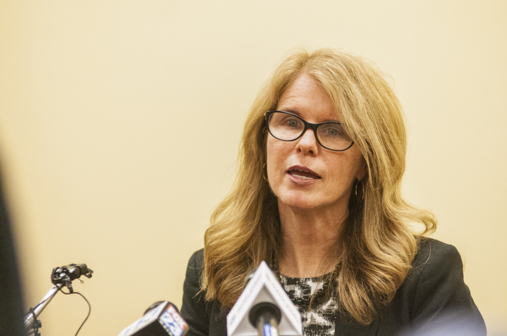 AUGUSTA, ME - MAY 24: Health and Human Services Commissioner Mary Mayhew reads a statement to reporters on Wednesday May 24, 2017 at the department headquarters in Augusta. She took no questions during the brief news conference about her departure from the DHHS. (Staff photo by Joe Phelan/Staff Photographer)