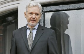 WikiLeaks founder Julian Assange speaks from the balcony of the Ecuadorean Embassy in London on  Feb. 5, 2016. 