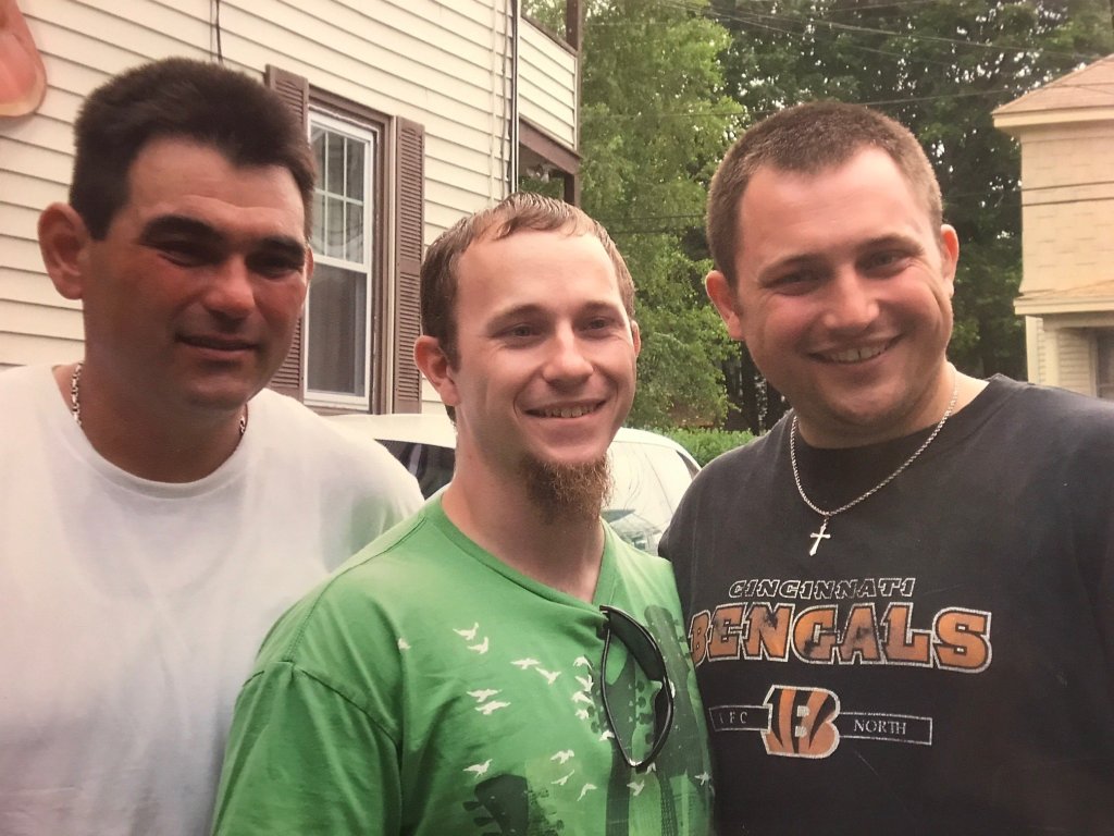 Jeffrey Lude, left, and his brothers Jared and Damian Renadette in 2013.