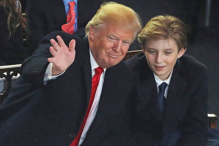 President Trump and his son Barron attend the Inaugural Parade in Washington on Jan. 20, 2017. 