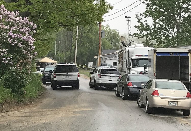 Police vehicles are at the scene Monday afternoon where a man was fatally shot by York County sheriff's deputies. 