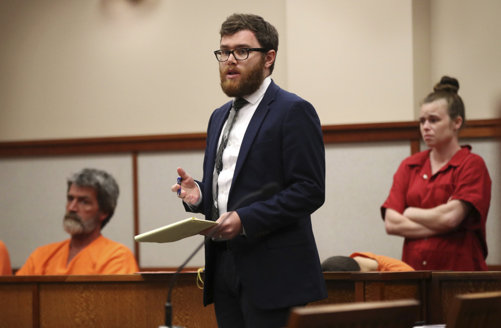 Attorney Taylor Sampson addresses the judge while defending indigent citizens at Cumberland County Superior Court in Portland. Maine is the only state in the nation without a public defender's office.