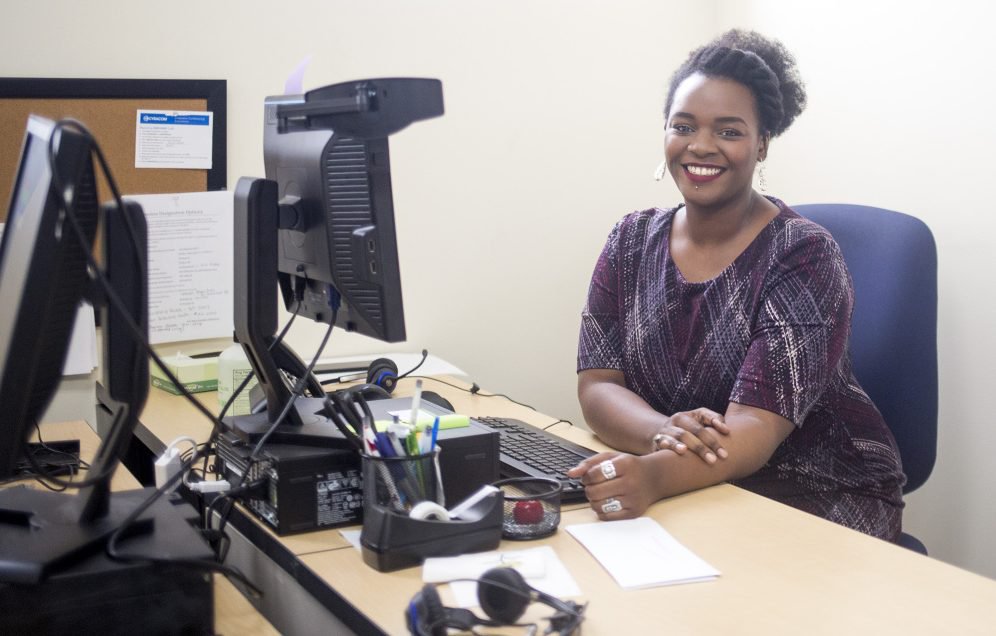 Joanna Nganda participated in Portland's "workfare" program, then used that experience to get a job at Greater Portland Health, left. "I don't think I would have been able to get this job without the workfare program," she said.