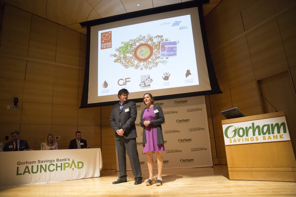 Jennifer Scism and David Koorits, owners of the Kittery business Good To-Go, make their seven-minute pitch Tuesday night at the LaunchPad competition at the University of Southern Maine in Portland. The husband-and-wife team won the $50,000 prize.
