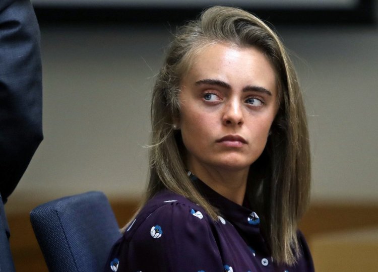 Defendant Michelle Carter listens to testimony at Taunton District Court in Taunton, Mass., on Thursday. Carter is charged with involuntary manslaughter for encouraging Conrad Roy III to kill himself in July 2014.