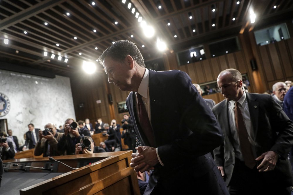 Fired FBI director James Comey leaves Thursday's hearing with the Senate Intelligence Committee after detailing his interactions with President Trump before his firing May 9. Comey's testimony prompted calls for an expansion of ongoing probes into Russia's role in the presidential election.