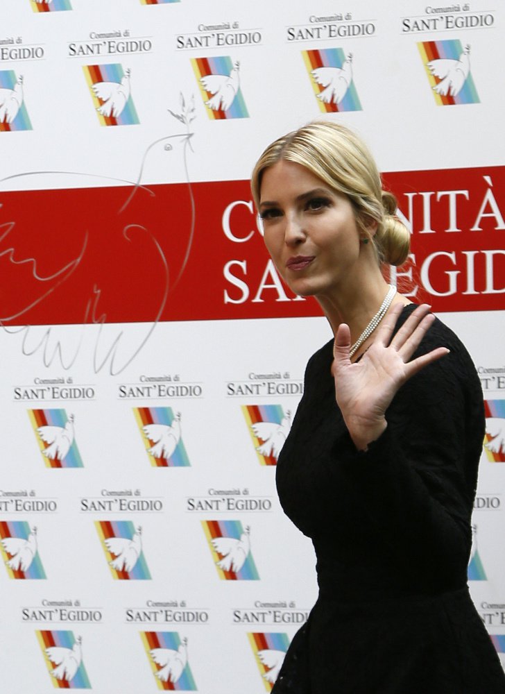 Ivanka Trump waves as she arrives at the Catholic group Sant‚Äô Egidio to talk about human trafficking, in Rome, Wednesday, May 24, 2017. President Donald Trump and Pope Francis, two leaders with contrasting styles and differing worldviews, met at the Vatican City on Wednesday, setting aside their previous clashes to broadcast a tone of peace for an audience around the globe. (AP Photo/Domenico Stinellis)