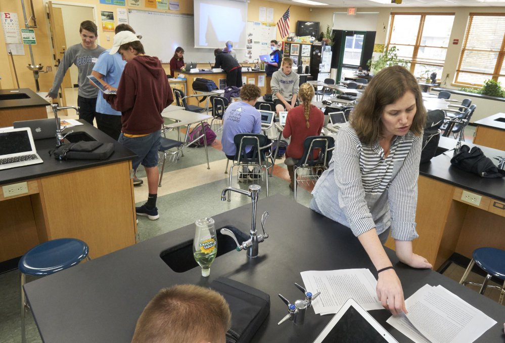 2017 file photo: Yarmouth science teacher Catie Wooten reviews a plan for a mock news conference as part of proficiency-based learning.