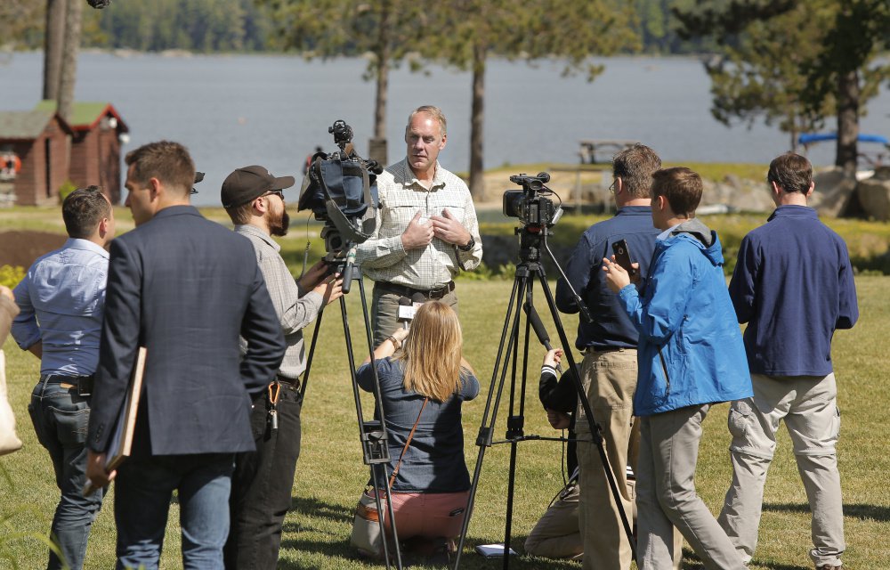 Interior Secretary Ryan Zinke speaks with the media after breakfast with the Katahdin Area Chamber of Commerce and Millinocket Town Council at Twin Pines Camps in Township 2, Range 8. During his Maine tour, Zinke made repeated statements about the beauty of the Katahdin region and people's passion for the land.