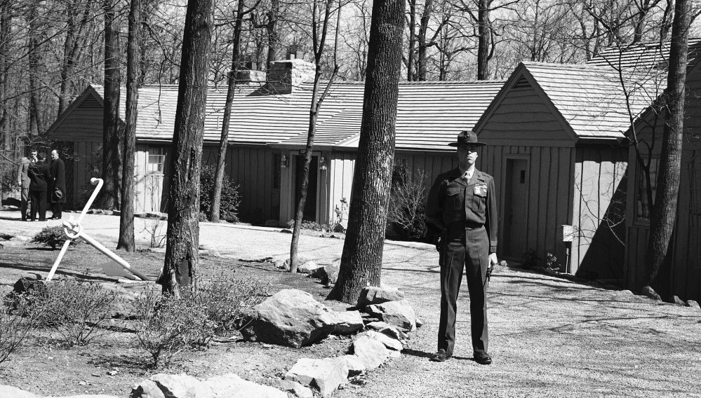 A Marine captain stands guard at Camp David in 1959 during talks between President Dwight Eisenhower and British Prime Minister Harold MacMillan on the Berlin situation.