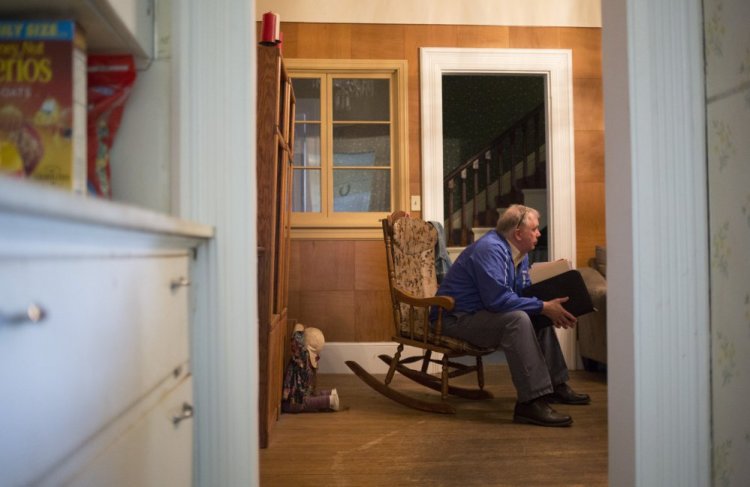 Butch Pratt, truancy officer for Lewiston public schools, listens to Maria Ouellette talk at her home about the struggles of dealing with her 15-year-old daughter's truancy. Pratt often makes house calls and works with parents on trying to deal with their children's absences.