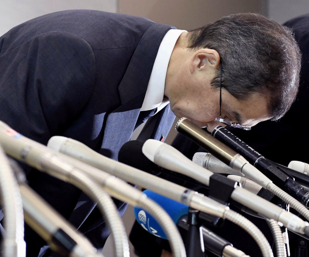 Japanese air bag maker Takata Corp. CEO Shigehisa Takada bows at the beginning of a news conference in Tokyo on Monday. Takata Corp. has filed for bankruptcy protection.