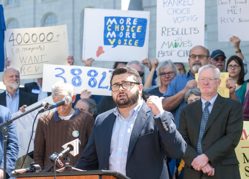 Adam Pontius, coalition coordinator for the Yes on 5 campaign, speaks at a rally to defend ranked-choice voting June 1 in Augusta.