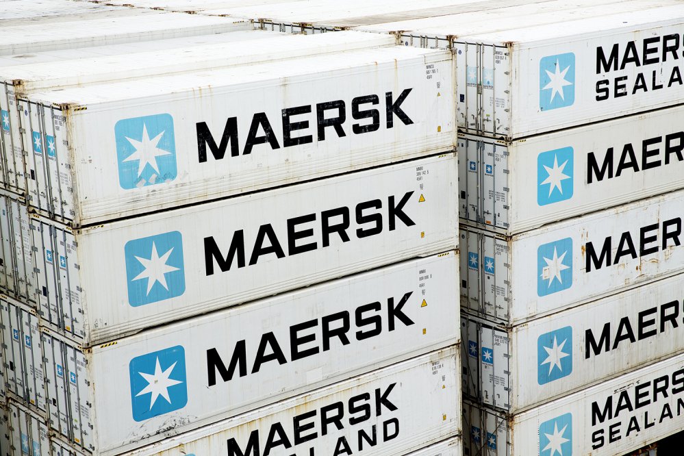 A.P. Moller-Maersk containers sit on a ship in the Panama Canal in 2014. The shipping company said every branch of its business was affected by the cyberattack Tuesday.