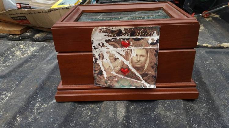 Photos of the box containing Chauncey Markham's ashes were posted in several public Facebook groups in an effort to find the family.  