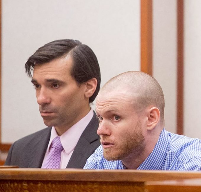 Justin Kristiansen, right, and his attorney, Luke Rioux, appear in court May 8. Kristiansen is accused of stabbing a cab driver in Portland.