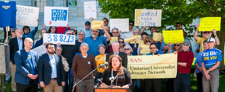 Former state Rep. Diane Russell of Portland speaks during Thursday's Rally To Defend Ranked Choice Voting.