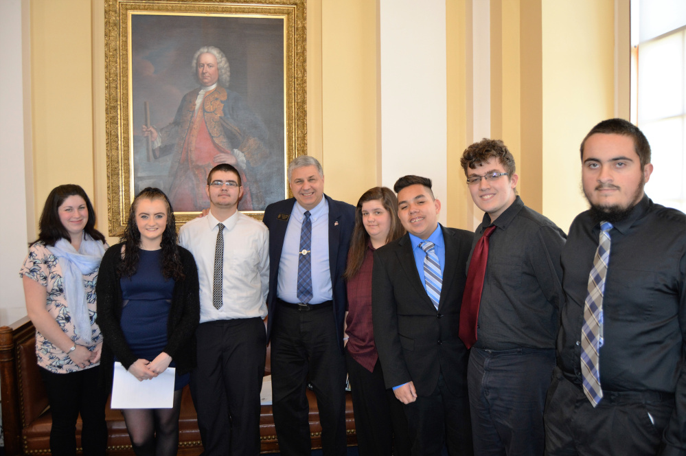 Students from the Jobs for Maine's Graduates program at Lawrence High School in Fairfield visited the State House in Augusta on May 16. From left are Katherine Wood, Keristin Grant, Hunter Loder, Sen. Scott Cyrway, Keisha Peace, Fernando Cuares, Seldon Thompson and Nicholas Richardson.