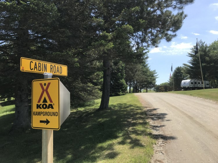 The road leading to the campground where the owners say campers escalated an incident with a man with special needs who was slashing tires with a pocket knife.