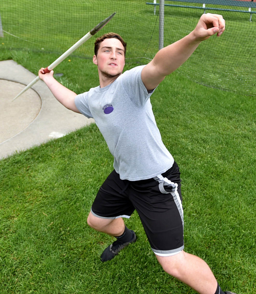 Waterville's Zack Smith throws the javelin during practice Wednesday at the high school.