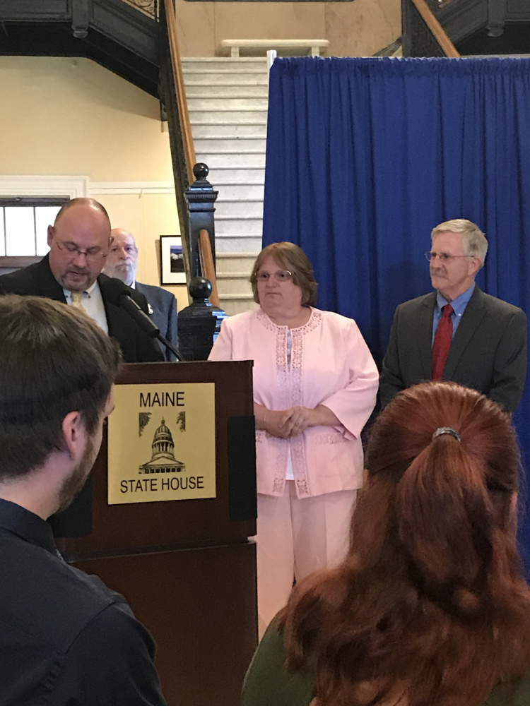 From left are Maine Emergency Medical Services Director Shaun St. Germain, Carol Pillsbury and EMS Board Chairman Jeff Rowe.