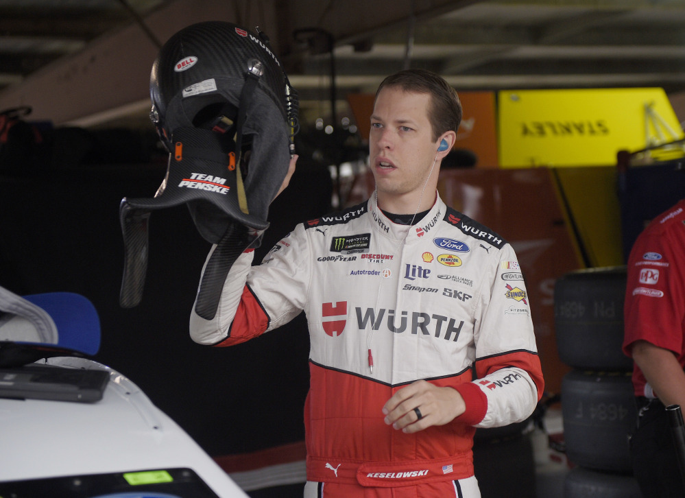 Brad Keselowski gets ready before practice for the NASCAR Cup series race Saturday at Dover International Speedway.