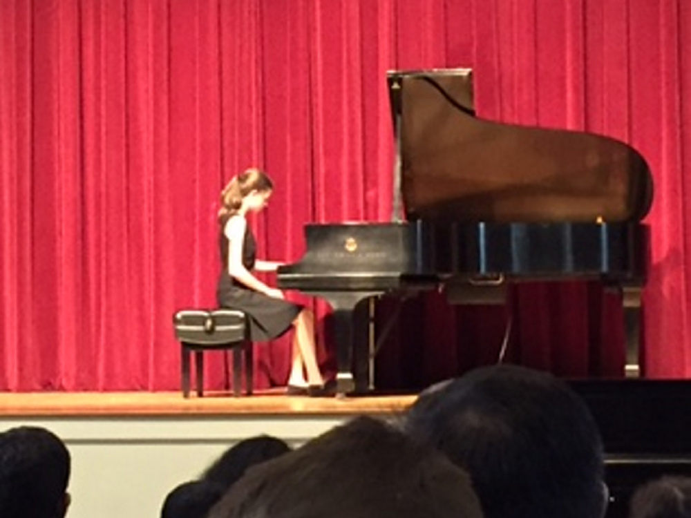 Inga Zimba, an eighth grader at Waterville Junior High School, at the piano during the Pine Tree Piano Festival in Bethel. She won third place in the Junior Division.