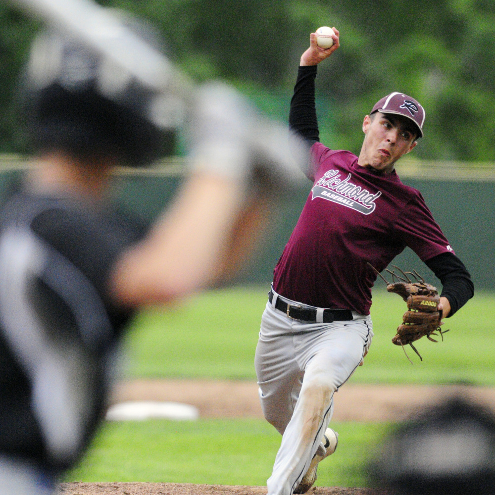 Staff photo by Joe Phelan 
 Richmond's Zach Small delivers a pitch to Searsport during the Class D South regional final Tuesday at St. Joseph's College in Standish.