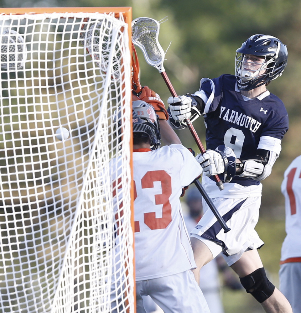 Yarmouths forward Cooper May shoots and scores on Gardiner goalie Noah Keene during the B North title game Wednesday at Hoch Field in Gardiner.